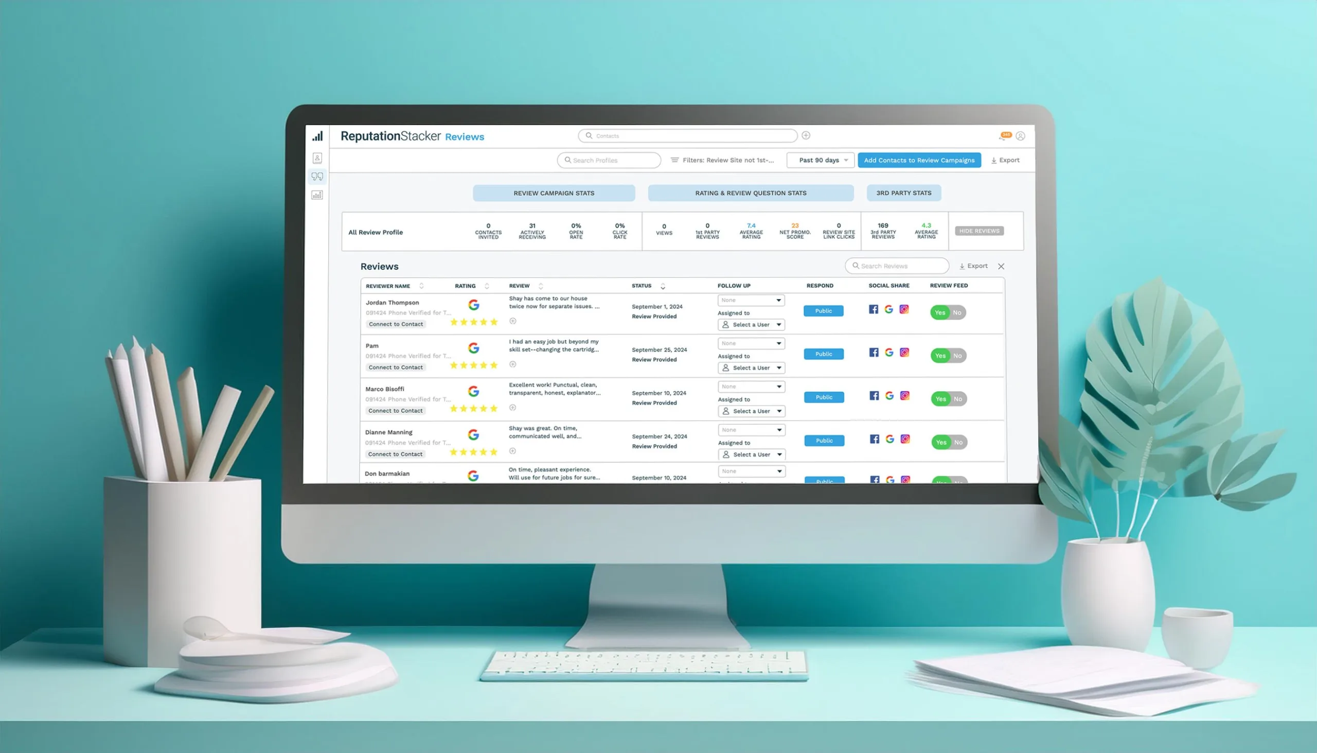 A computer monitor displays ReputationStacker review management software